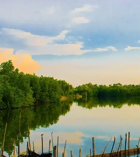 Sunset over Madu River during scenic boat ride
